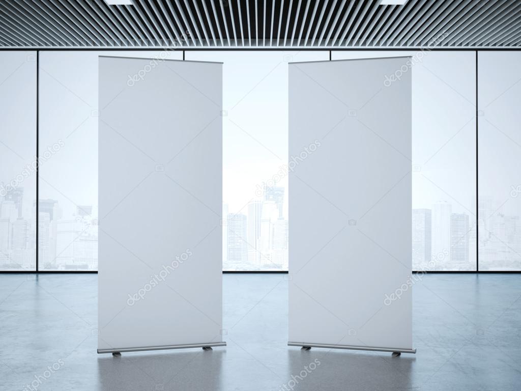 Two roll up banners at office. 3d rendering