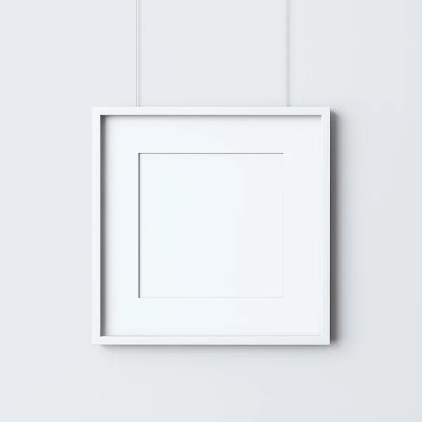 Beyaz duvardaki boş çerçeve — Stok fotoğraf