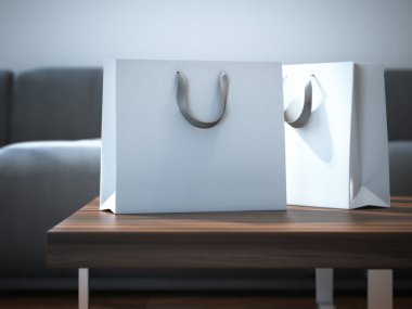 Ttwo beyaz paketleri masada. 3D render