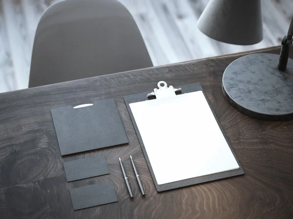 Una maqueta negra en la mesa de madera. renderizado 3d —  Fotos de Stock