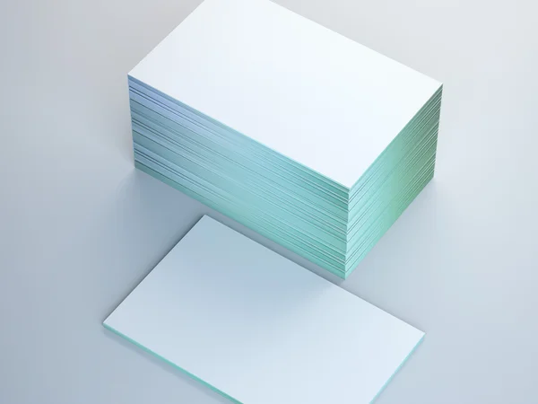 Pilha de cartões de visita no piso branco — Fotografia de Stock