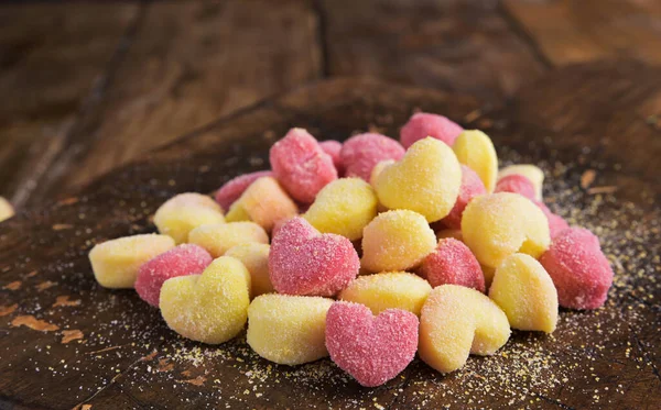 Gnocchi. Traditional Italian pasta with heart-shaped potatoes in different colors. Fresh cooked food from the south of italy.