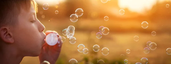 Child Blowing Soap Bubbles Summer Day Sunset Nature Concept Happy — Stock Photo, Image