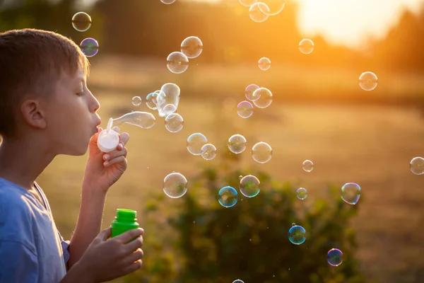 Child Blowing Soap Bubbles Summer Day Sunset Nature Concept Happy — Stock Photo, Image