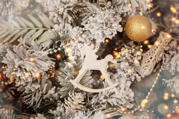 Decoration white horse on christmas tree. Christmas toy. Rocking — Stock Photo, Image