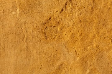 Yellow stucco wall
