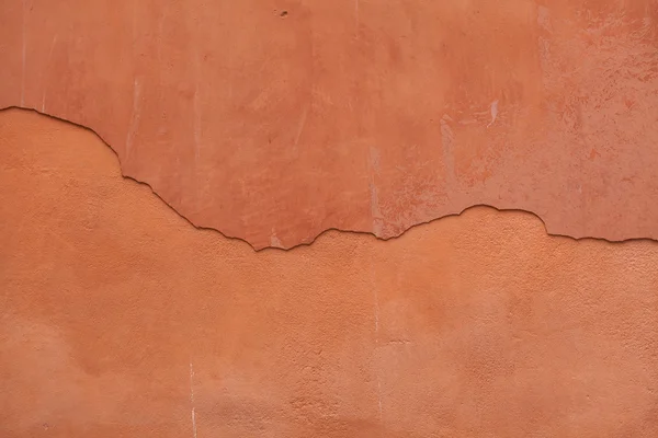 Oude terracotta geschilderde gepleisterde muur — Stockfoto