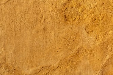 Yellow stucco wall