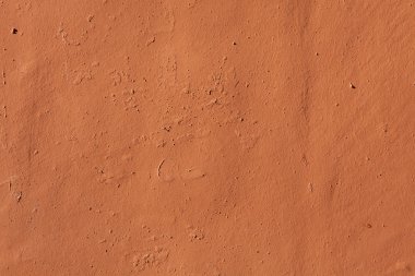 Pişmiş toprak boyalı sıva duvar.