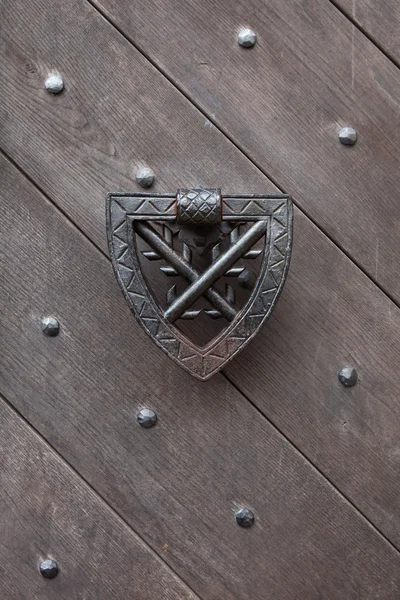 Doorknocker on wooden gate — Stock Photo, Image