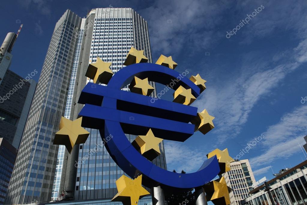 FRANKFURT AM MAIN, GERMANY - JUNE 14, 2015: Euro logo by German visual artist Ottmar Hoerl in front of the Eurotower in Frankfurt am Main, Hesse, Germany