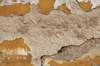 Çatlak alçılı eski duvar. Arkaplan dokusu.