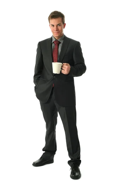 Jeune homme d'affaires avec tasse de thé — Photo