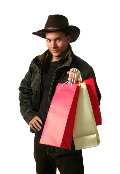 Jeune homme avec des sacs à provisions — Photo