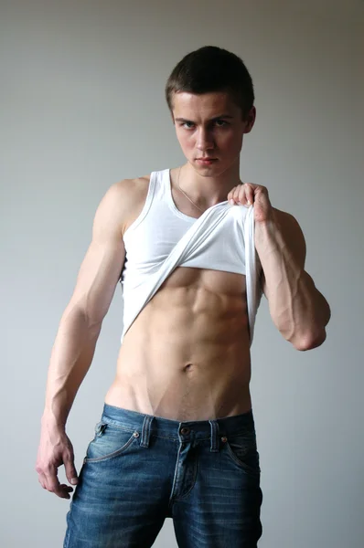 Sexy Young Man Showing His Abs — Stock Photo, Image