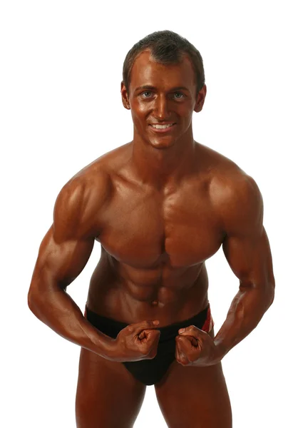 彼の筋肉を示すボディービルダー — ストック写真
