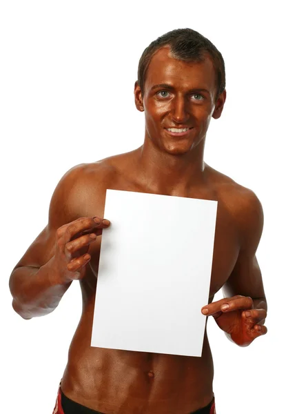 Bodybuilder showing a copy space bank page — Stock Photo, Image