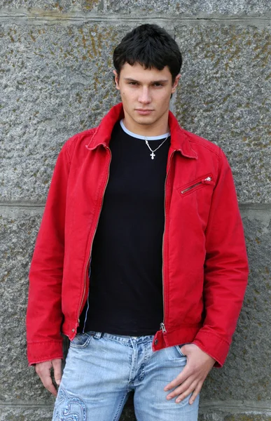 Teenager near the wall — Stock Photo, Image