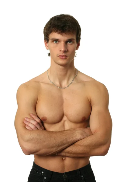Giovane uomo muscolare isolato su bianco — Foto Stock