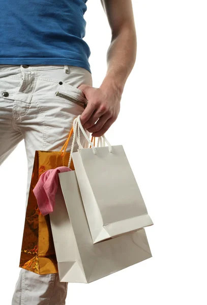 Jeune homme avec des sacs à provisions — Photo