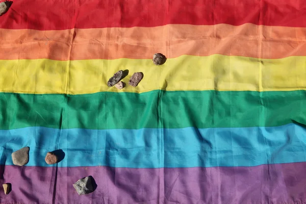 Jewish stones lie on the rainbow flag — Stock Photo, Image