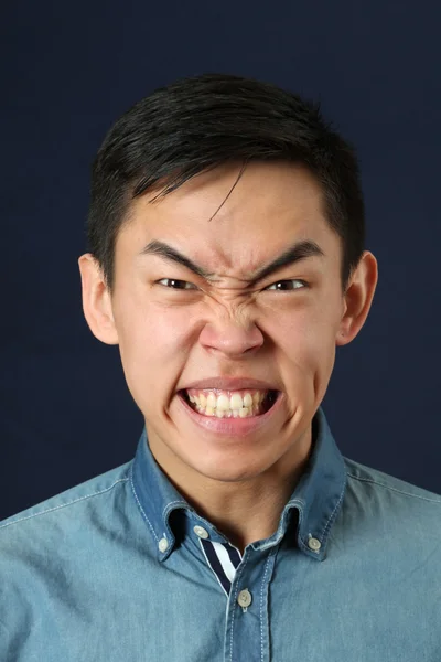 Angry young Asian man — Stock Photo, Image
