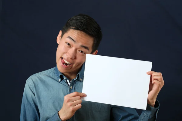 Asian man showing blank board — Stock Photo, Image