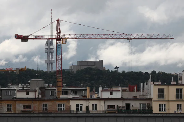 Lifting crane in front of the Zizkov Tower
