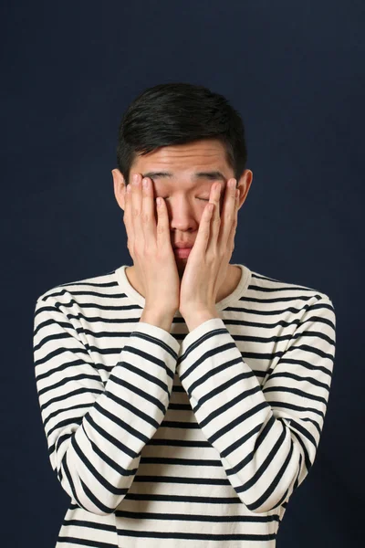 Disappointed young Asian man — Stock Photo, Image