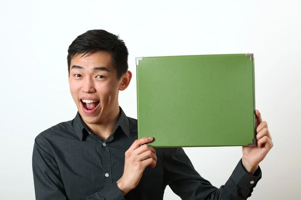 Man showing green box — Stock Photo, Image