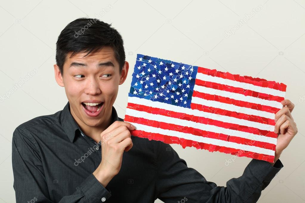 Student showing US flag