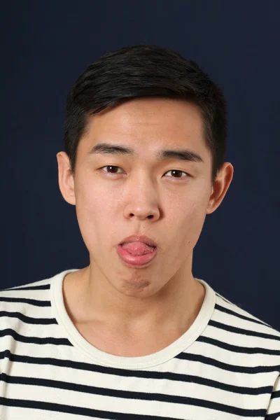 Asian man making face — Stock Photo, Image