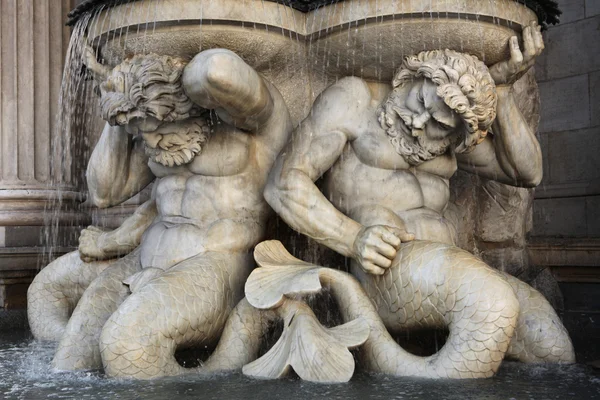 Tritones support the Danube Fountain in Vienna — Stock Photo, Image