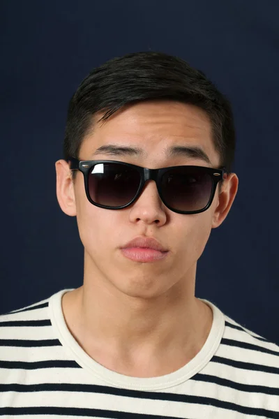 Asian man in sunglasses — Stock Photo, Image