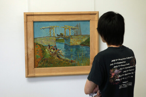 Visitor looks at the painting in the Kroller Muller Museum