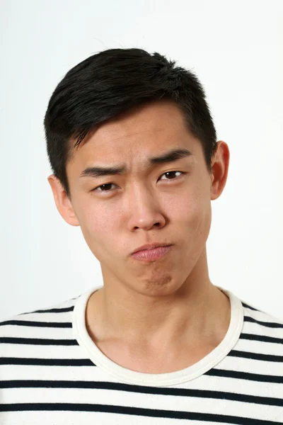 Strict young Asian man — Stock Photo, Image