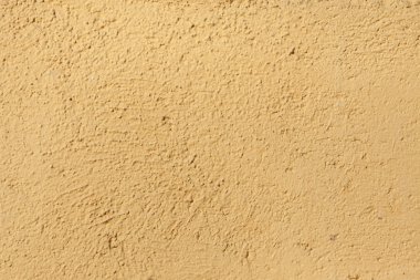 Yellow stucco wall