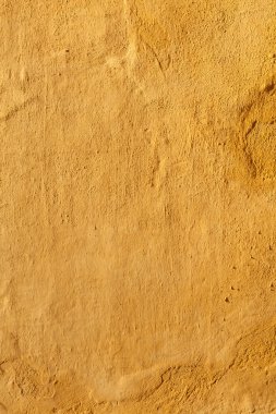Yellow stucco wall