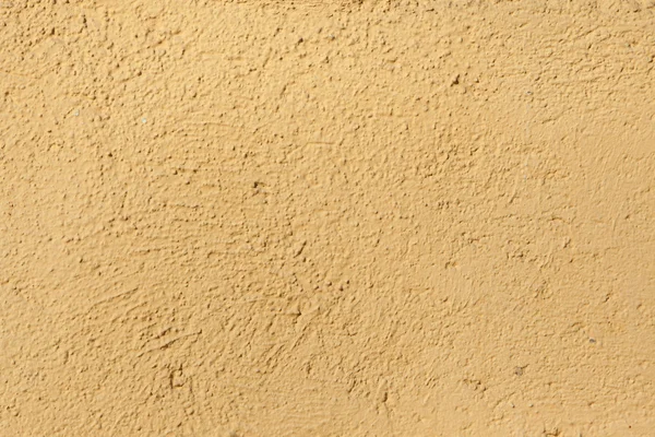Yellow stucco wall