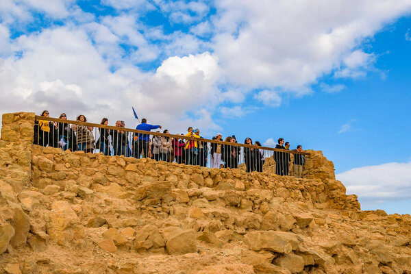 JUDEA, ISRAEL, DECEMBER - 2019 - Tourists crowd at masada national park fort, Judea, Israel