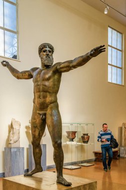 ATHENS, GREECE, JANUARY - 2020 - Atina arkeolojik müzesinde bulunan ünlü zues veya poseidon heykeli
