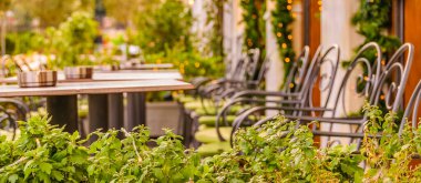 Urban winter day scene at typical touristic restaurants zone in plaka district.