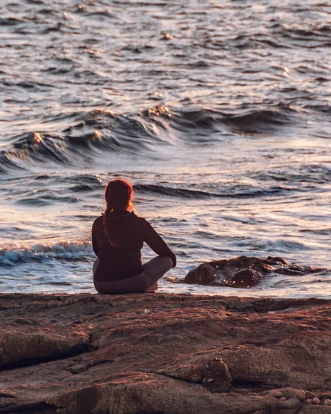 Back View Woman Sitting Rocky Shore Montevideo City Uruguay — Stock Photo, Image