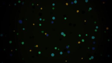 Rastgele yönlere hareket eden sayısız çok renkli parçacığın derin siyah bir arkaplana karşı döngü içinde olduğu kusursuz bir 2B animasyon..