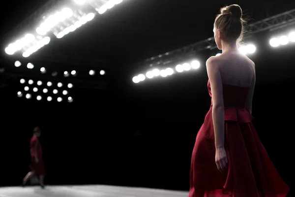 depositphotos_101799920-stock-photo-fashion-show-a-catwalk-even