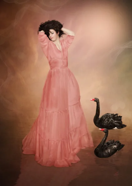 Girl and black swans — Stock Photo, Image