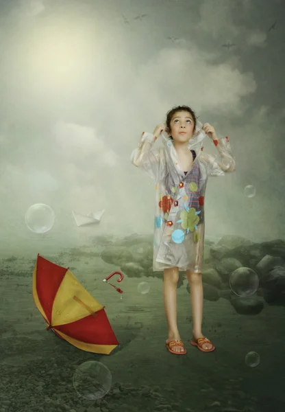 Little girl in a raincoat — Stock Photo, Image