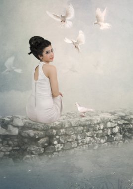 Beyaz elbiseli genç kız.