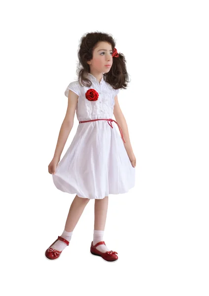 Klein meisje in witte jurk — Stockfoto