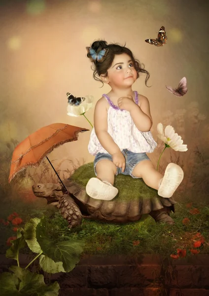 Kleines Mädchen auf Schildkröte — Stockfoto
